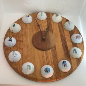 Tan and White Wall Clock with Minimalist Design